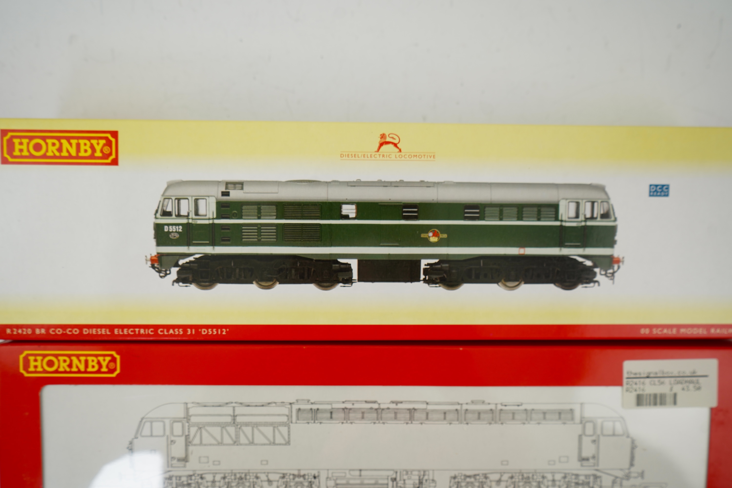 Two boxed Hornby Hobbies 00 gauge railway diesel-electric locomotives; a Loadhaul class 56 Co-Co, 56107, (R2416), together with a BR class 31 A-1-A, D5512, (R2420)